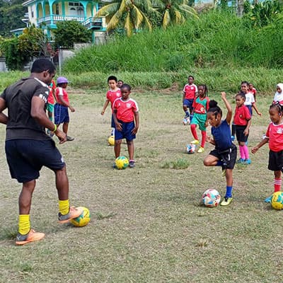 Coach George demonstrating how a drill is done