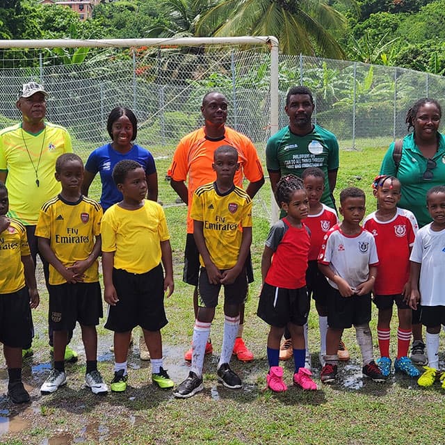 Under 8 team posing for photos
