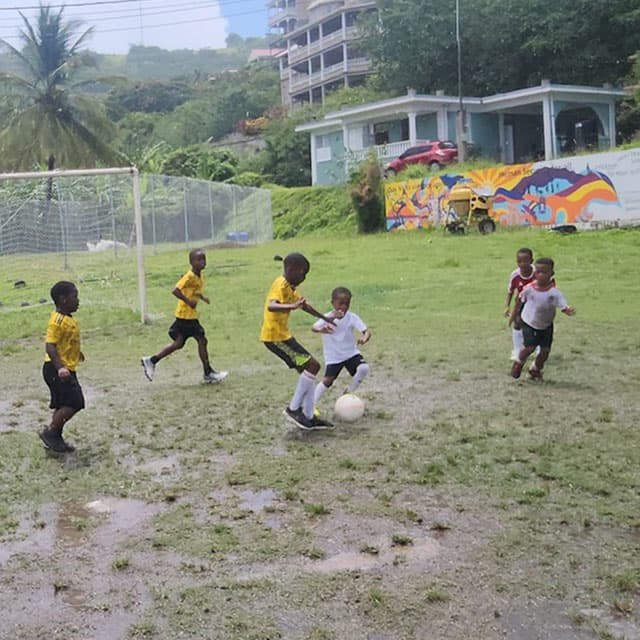The Under 8 match being played. St. Joseph won 1 - 0