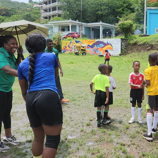 Both Under 8 teams shaking hands