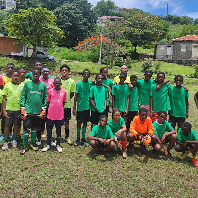 Both Under 14 teams posing for a photo