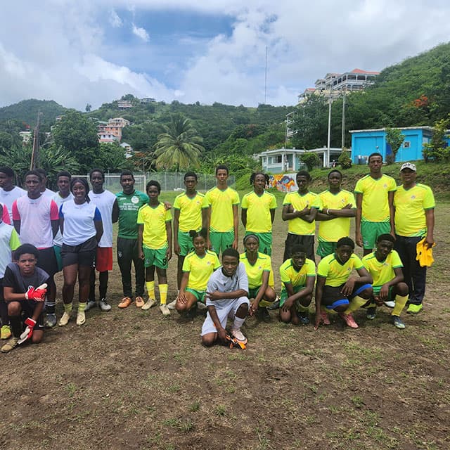 Both Under 16 teams posing for a photo