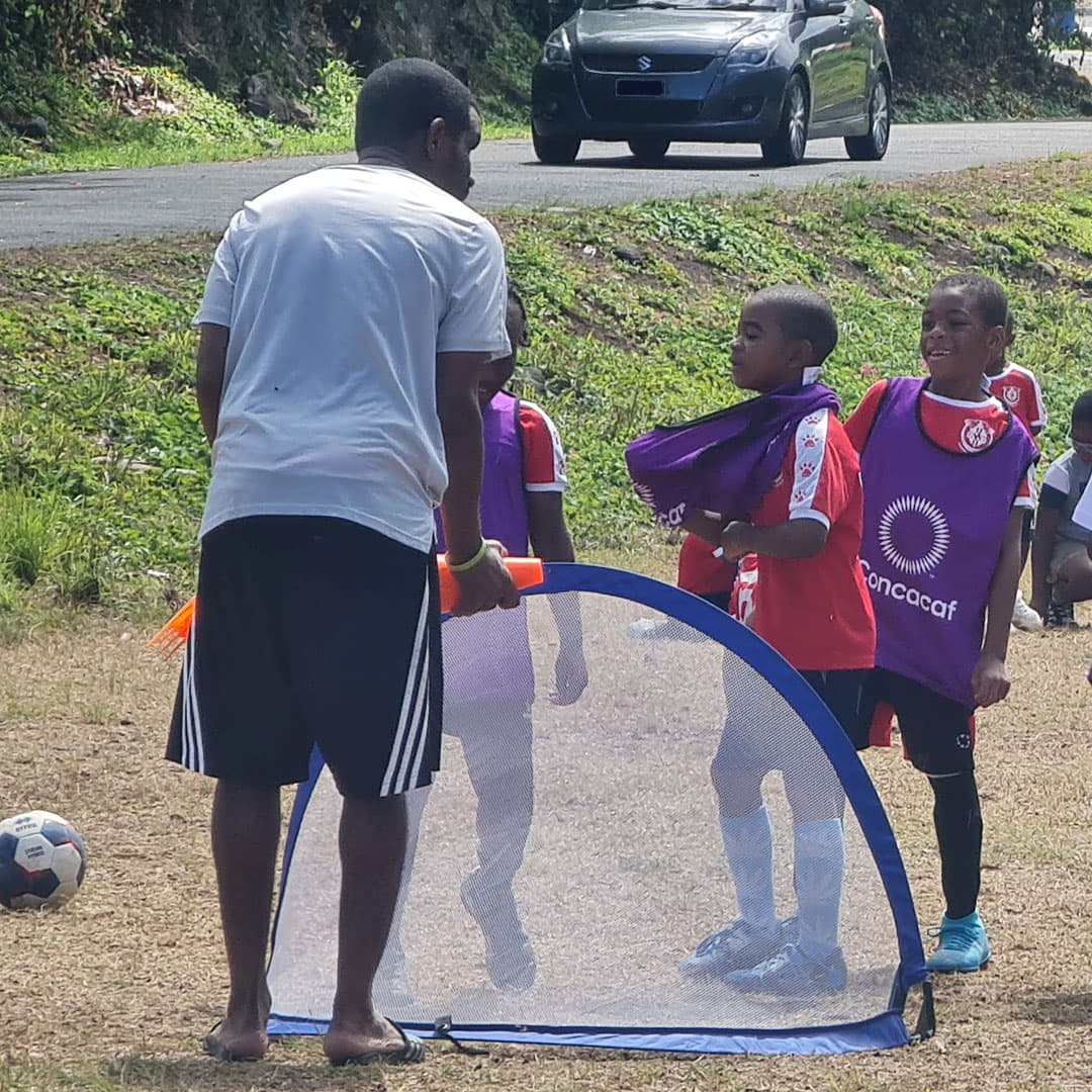 Coach George preparing the field for a practice match